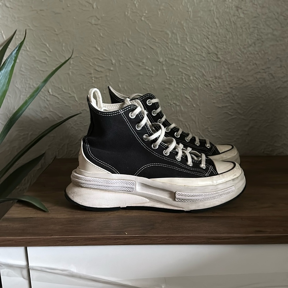 Black platform converse high top men’s size 9, women’s 10.5.
